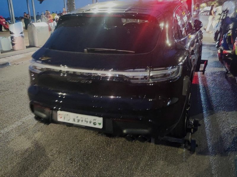 Recovered Porsche Macan GTS secured at night for cross-border transport